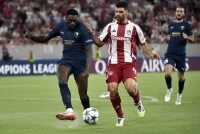 المپیاکوس با طارمی به استقبال بارسلونا رفت + عکس