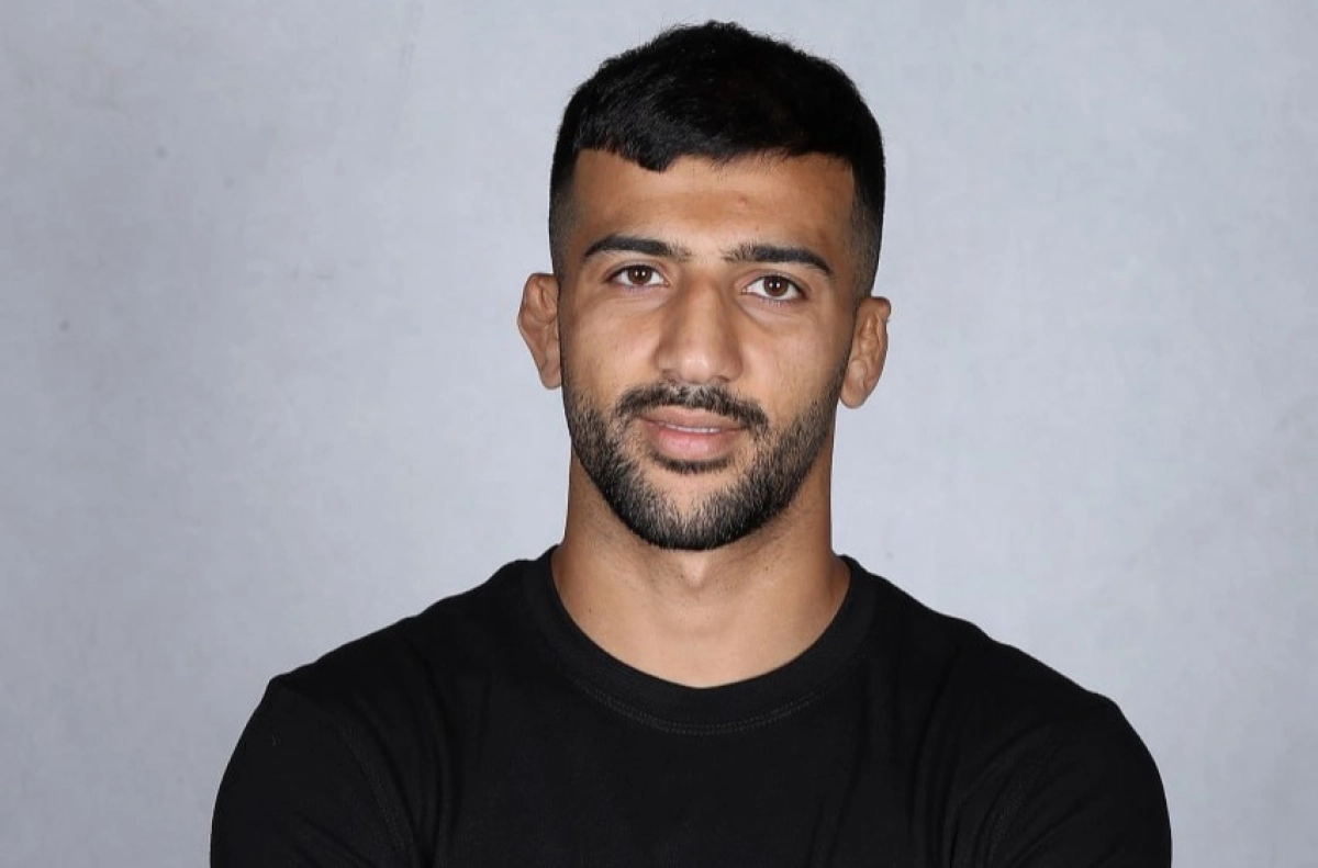 کشتکار، حریف چینی را از پیش رو برداشت؛ یک گام دیگر تا نیمه‌نهایی