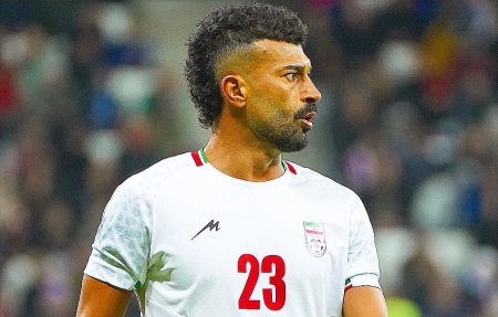 پست کنایه‌آمیز رضاییان با پیراهن تیم ملی و قلب آبی! + عکس