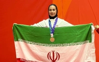 ریحانه کریمی تاریخ‌ساز شد؛ نخستین مدال‌آور زن وزنه‌برداری ایران